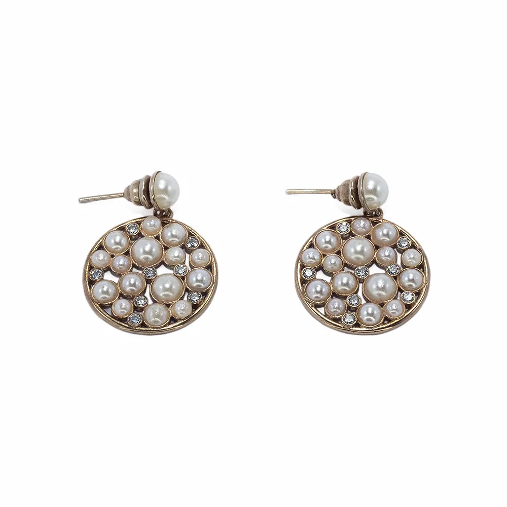 Earrings with sea shell pearls